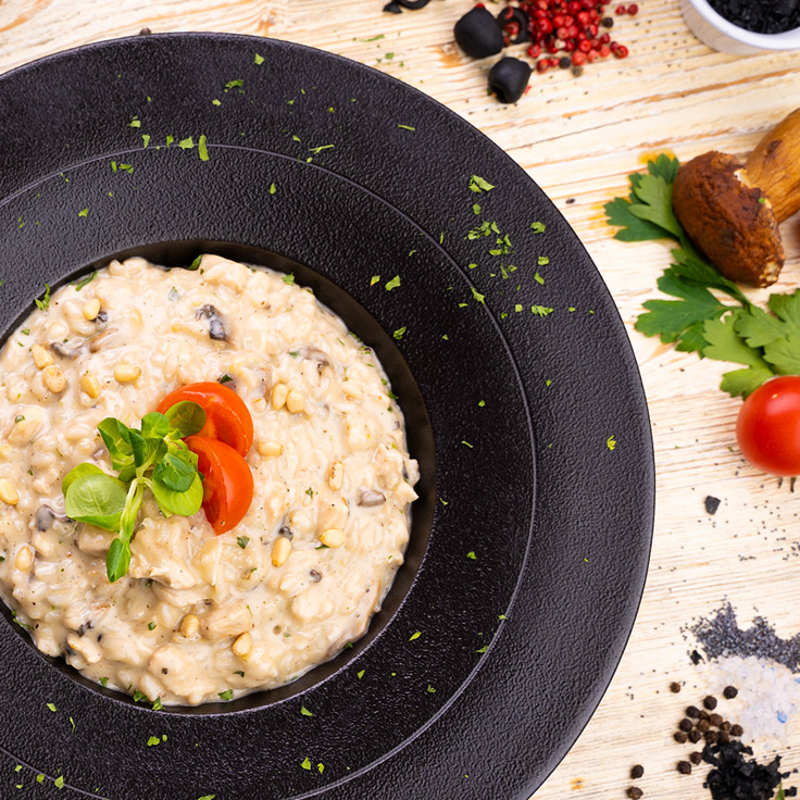 Risotto with chicken and pine nuts